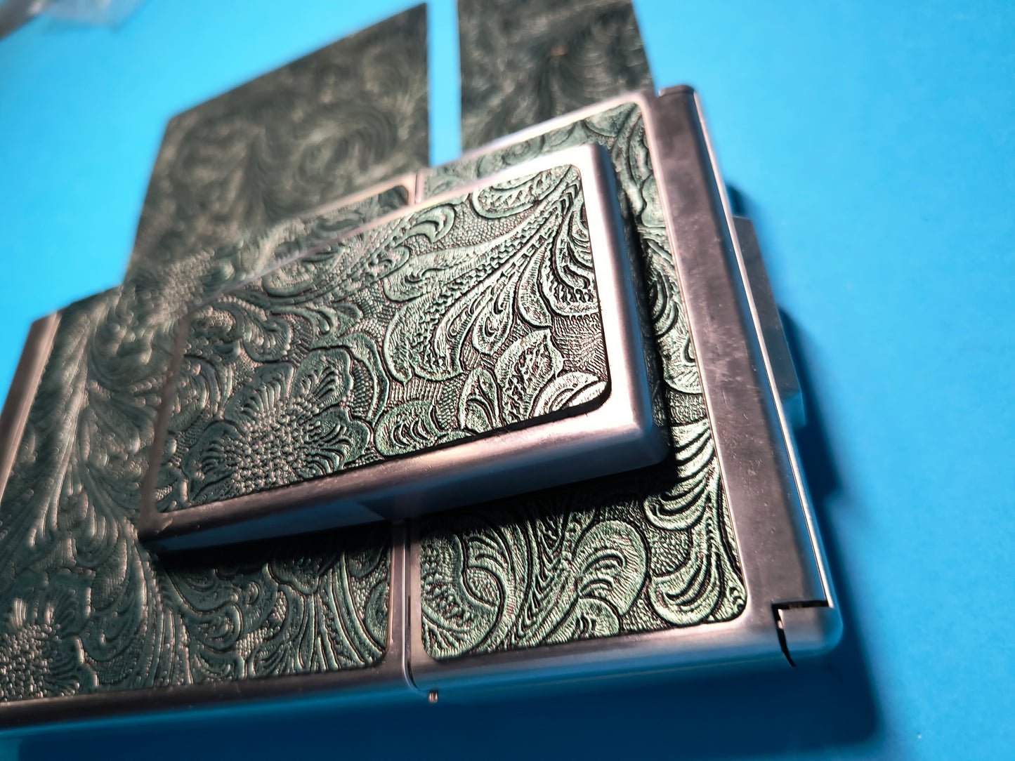 SKIN tema floreale verde metallico
